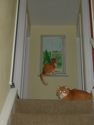 Trompe l'oeil mural at the top of the stairs